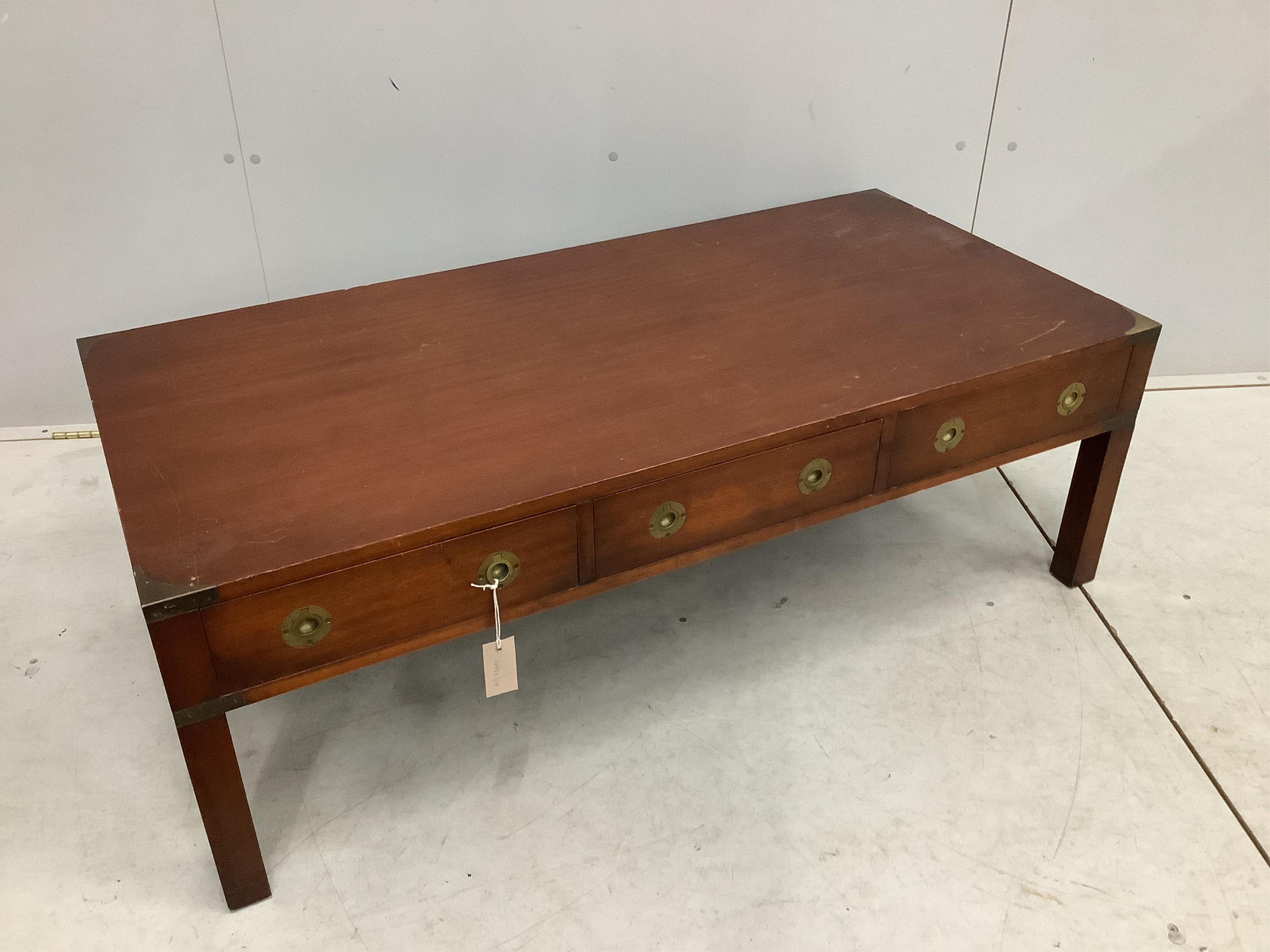 A military style brass mounted rectangular mahogany coffee table, dummy drawers to one side, width 122cm, depth 58cm, height 41cm. Condition - fair